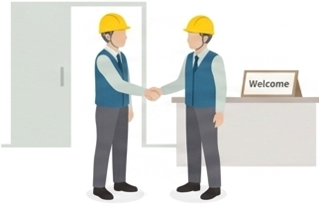 先輩と一緒に現場に入る新入社員